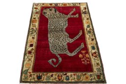 Surface texture of 2000s Shiraz rug with natural Wool and intricate pattern