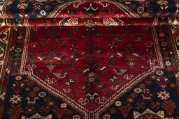 Corner detail of 2000s Shiraz rug showing border pattern and Wool pile