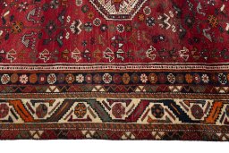 Full view of 2000s Shiraz rug from Iran / Persia, 259 × 160 cm in Red tones