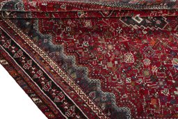 Corner detail of 1970s Shiraz rug showing border pattern and Wool pile