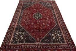 Surface texture of 1970s Shiraz rug with natural Wool and intricate pattern
