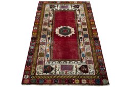 Surface texture of 2000s Shiraz rug with natural Wool and intricate pattern