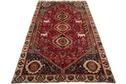 Surface texture of 2000s Shiraz rug with natural Wool and intricate pattern