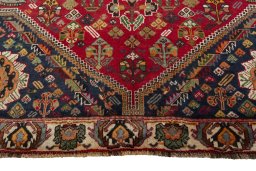 Central medallion detail of 2000s Shiraz rug from Iran / Persia