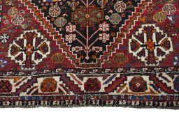 Close-up detail of 2000s Shiraz rug from Iran / Persia showing Wool weave