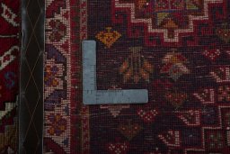 Close-up detail of 2000s Shiraz rug from Iran / Persia showing Wool weave