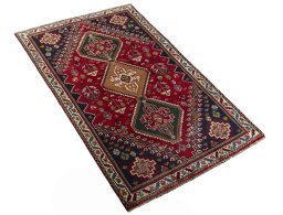 Close-up detail of 2000s Shiraz rug from Iran / Persia showing Wool weave