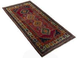 Close-up detail of 2000s Shiraz rug from Iran / Persia showing Wool weave