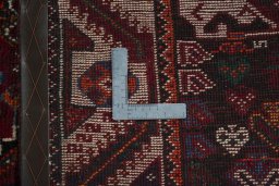 Close-up detail of 2000s Shiraz rug from Iran / Persia showing Wool weave