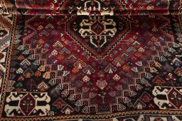 Full view of 2000s Shiraz rug from Iran / Persia, 267 × 172 cm in Red tones
