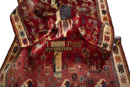 Corner detail of 2000s Shiraz rug showing border pattern and Wool pile