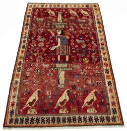 Surface texture of 2000s Shiraz rug with natural Wool and intricate pattern