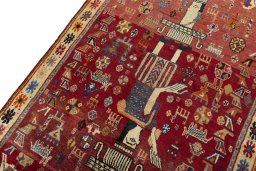 Backside of handmade 2000s Shiraz rug showing knot structure and weave density