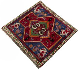 Corner detail of 2000s Shiraz rug showing border pattern and Wool pile