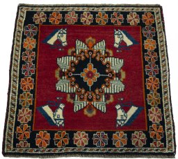Surface texture of 2000s Shiraz rug with natural Wool and intricate pattern