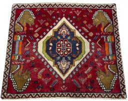 Surface texture of 2000s Shiraz rug with natural Wool and intricate pattern