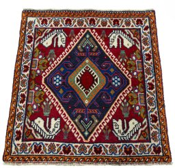 Surface texture of 2000s Shiraz rug with natural Wool and intricate pattern