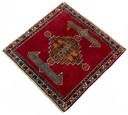 Corner detail of 2000s Shiraz rug showing border pattern and Wool pile