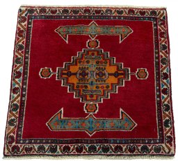 Surface texture of 2000s Shiraz rug with natural Wool and intricate pattern