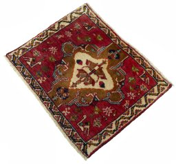 Corner detail of 2000s Shiraz rug showing border pattern and Wool pile