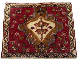 Surface texture of 2000s Shiraz rug with natural Wool and intricate pattern