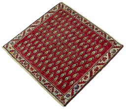 Corner detail of 2000s Shiraz rug showing border pattern and Wool pile