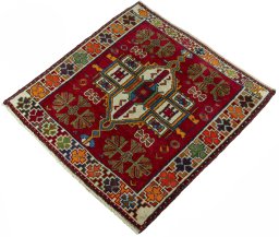 Corner detail of 2000s Shiraz rug showing border pattern and Wool pile