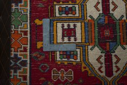 Backside of handmade 2000s Shiraz rug showing knot structure and weave density