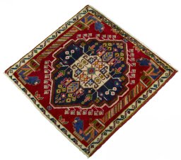 Corner detail of 2000s Shiraz rug showing border pattern and Wool pile