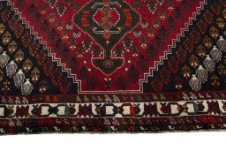 Central medallion detail of 2000s Shiraz rug from Iran / Persia