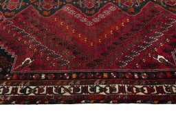 Close-up detail of 2000s Shiraz rug from Iran / Persia showing Wool weave