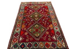 Surface texture of 2000s Shiraz rug with natural Wool and intricate pattern