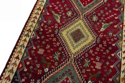 Backside of handmade 2000s Shiraz rug showing knot structure and weave density