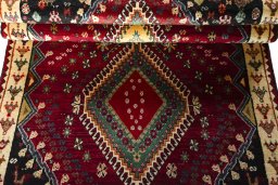 Full view of 2000s Shiraz rug from Iran / Persia, 220 × 108 cm in Red tones