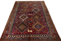 Surface texture of 2000s Shiraz rug with natural Wool and intricate pattern