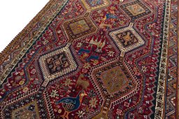 Backside of handmade 2000s Shiraz rug showing knot structure and weave density