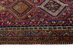 Close-up detail of 2000s Shiraz rug from Iran / Persia showing Wool weave