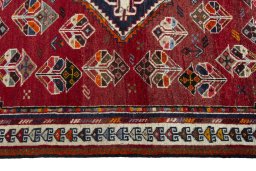Full view of 2000s Shiraz rug from Iran / Persia, 210 × 124 cm in Red tones