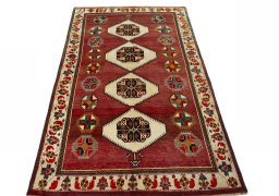 Surface texture of 2000s Shiraz rug with natural Wool and intricate pattern