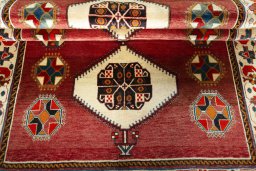 Full view of 2000s Shiraz rug from Iran / Persia, 263 × 154 cm in Red tones