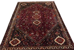 Surface texture of 2000s Shiraz rug with natural Wool and intricate pattern