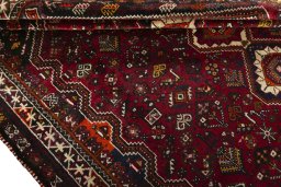 Full view of 2000s Shiraz rug from Iran / Persia, 318 × 231 cm in Red tones