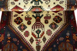 Corner detail of 2000s Shiraz rug showing border pattern and Wool pile