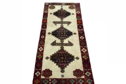 Surface texture of 2000s Shiraz rug with natural Wool and intricate pattern