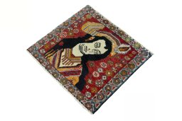 Corner detail of 2000s Shiraz rug showing border pattern and Wool pile