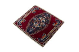 Corner detail of 2000s Shiraz rug showing border pattern and Wool pile