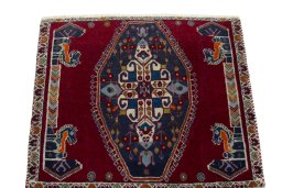 Surface texture of 2000s Shiraz rug with natural Wool and intricate pattern