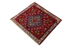 Corner detail of 2000s Shiraz rug showing border pattern and Wool pile