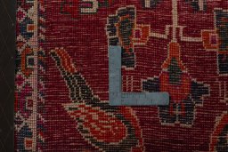 Backside of handmade 2000s Shiraz rug showing knot structure and weave density