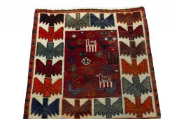 Surface texture of 2000s Shiraz rug with natural Wool and intricate pattern